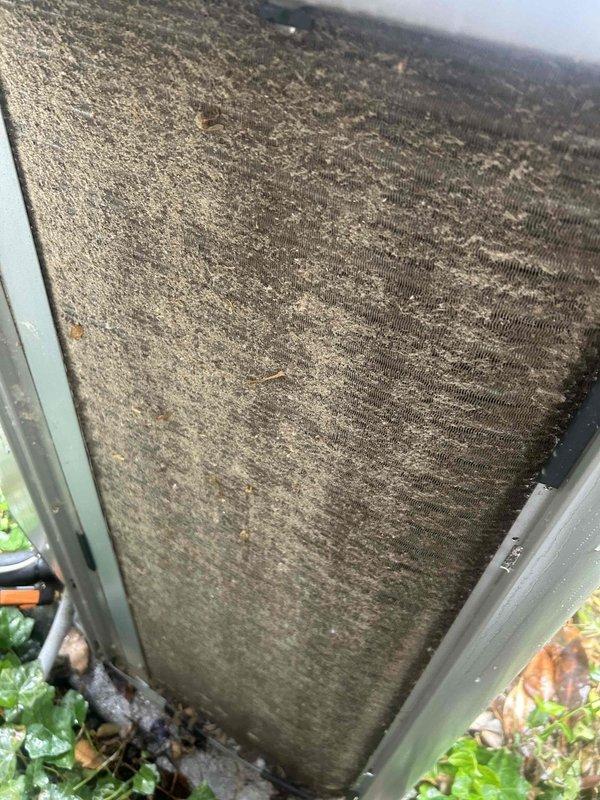 Completed Club Single maintenance on 3-year-old HVAC system with indoor unit in basement and outdoor condensing unit. Outdoor unit coils were heavily contaminated with dirt, dust, and debris accumulation, requiring thorough cleaning to restore proper heat exchange efficiency. Air filter showed extensive buildup of particulate matter and was serviced as part of maintenance protocol. System includes AprilAire 800 humidifier. All maintenance tasks completed per club membership agreement specifications.