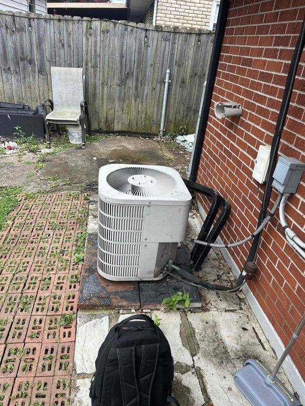 # HVAC Repair - No Cooling Condition

Responded to service call for 15-year-old residential air conditioning system with reported non-functional outdoor fan and lack of cooling. Upon arrival, confirmed compressor was energized but condenser fan motor failed to operate. 

Performed diagnostic testing of outdoor unit components including capacitor testing, contactor inspection, and motor winding continuity checks. Identified failed condenser fan motor as root cause of no-cool condition. Verified proper voltage supply to unit and confirmed compressor operation remained functional.

Replaced defective condenser fan motor with OEM-equivalent replacement unit. Installed new motor, secured mounting hardware, and reconnected electrical connections per manufacturer specifications. Tested capacitor under load and confirmed proper microfarad rating for both compressor and fan motor operation.

Energized system and verified proper condenser fan rotation and airflow across condenser coil. Monitored
