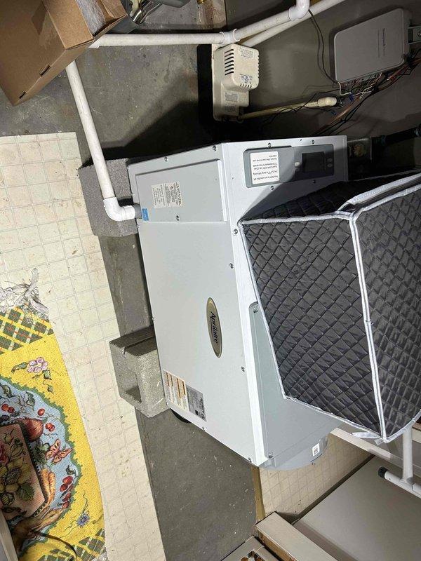 Completed comprehensive Club Duo maintenance service on dual HVAC systems including two air conditioning units, two gas furnaces, two humidifiers, and two dehumidifiers with all equipment located in basement. Performed full system inspections, verified proper operation and alignment of all components, inspected and assessed filter conditions across all units including washable filter on dehumidifier, checked humidifier canisters and pads for replacement needs, and documented equipment conditions with photographs. All systems tested and operating within normal parameters upon completion of preventive maintenance procedures.