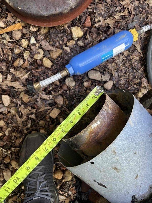 Responded to service call for roof penetration flashing repair around HVAC vent. Customer had previously repaired roof leak but required fabrication of custom storm collar or roof flashing boot that seals vent pipe penetration. Assessed existing roof penetration, took measurements of vent pipe diameter and clearances, and documented site conditions with photos to facilitate proper fabrication of replacement flashing component that was unavailable through standard supply channels.