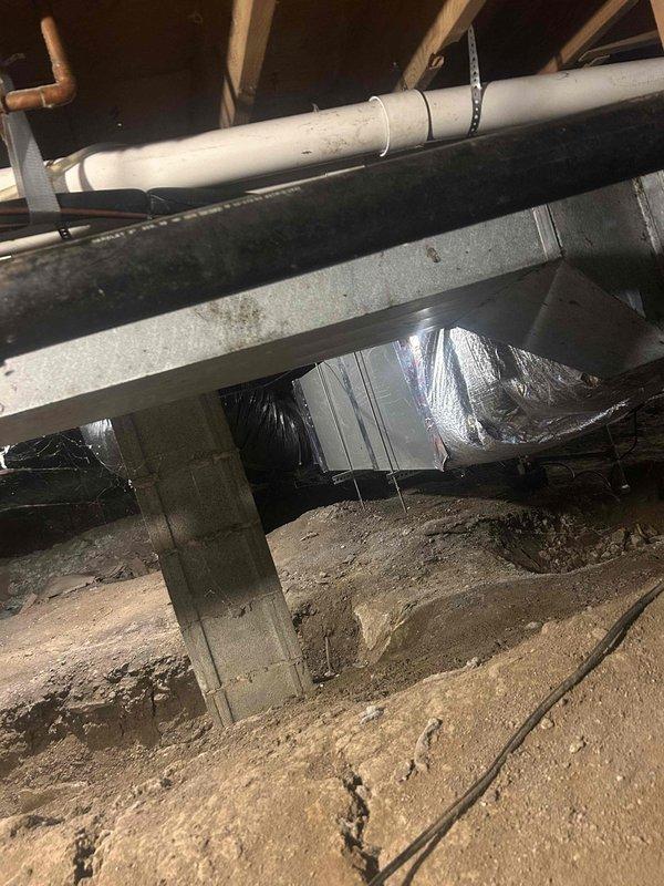 Conducted on-site evaluation for whole home dehumidifier installation. Assessed existing HVAC system configuration and inspected crawlspace infrastructure including ductwork routing, available mounting locations, and electrical access points. Documented current thermostat setup and evaluated integration requirements for humidity control equipment with existing climate control system.