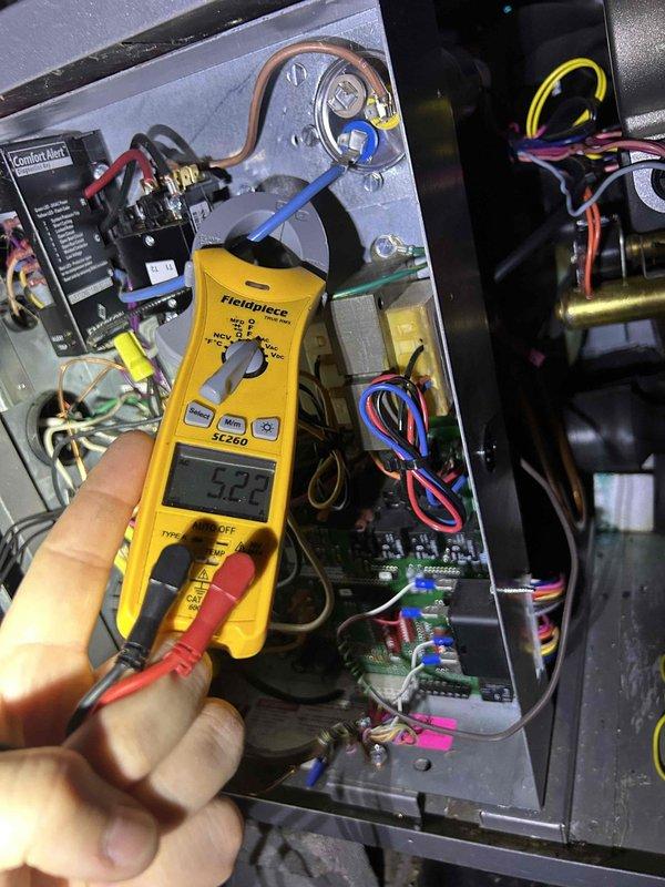 Completed comprehensive Gold Level prepaid maintenance on a three-unit HVAC system consisting of two geothermal units and one conventional system. Performed thorough inspection and testing of all electrical components, control boards, and wiring connections across all three units. Measured and documented amperage draw at 54.2 amps and voltage reading at 423 volts on system controls to verify proper electrical operation. Verified all contactors, relays, terminal blocks, and circuit boards functioning within manufacturer specifications. Inspected refrigerant line connections, brass fittings, and copper tubing for integrity. Confirmed proper wire routing and secured connections throughout control panels. Customer providing their own air filters: (2) 20x25x5 Lennox x6673 filters and (1) 16x25x5 Lennox x6670 filter. All systems operating normally with no deficiencies noted at time of service.