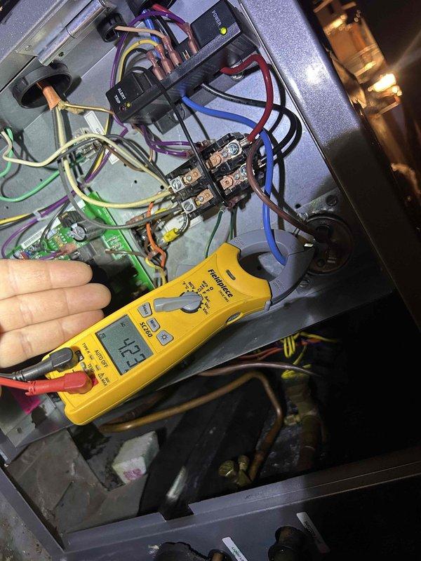 Completed comprehensive Gold Level prepaid maintenance on a three-unit HVAC system consisting of two geothermal units and one conventional system. Performed thorough inspection and testing of all electrical components, control boards, and wiring connections across all three units. Measured and documented amperage draw at 54.2 amps and voltage reading at 423 volts on system controls to verify proper electrical operation. Verified all contactors, relays, terminal blocks, and circuit boards functioning within manufacturer specifications. Inspected refrigerant line connections, brass fittings, and copper tubing for integrity. Confirmed proper wire routing and secured connections throughout control panels. Customer providing their own air filters: (2) 20x25x5 Lennox x6673 filters and (1) 16x25x5 Lennox x6670 filter. All systems operating normally with no deficiencies noted at time of service.