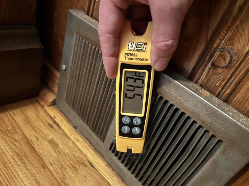Responded to no cooling call for 6-year-old Gibson air conditioning system. Upon arrival, verified system was not running and measured supply air temperature at floor register reading 77.5°F, confirming lack of cooling. Inspected outdoor condenser unit and found equipment in good physical condition with proper clearances from surrounding landscaping. Diagnosed issue, restored system to proper operation, and verified adequate airflow through floor registers.