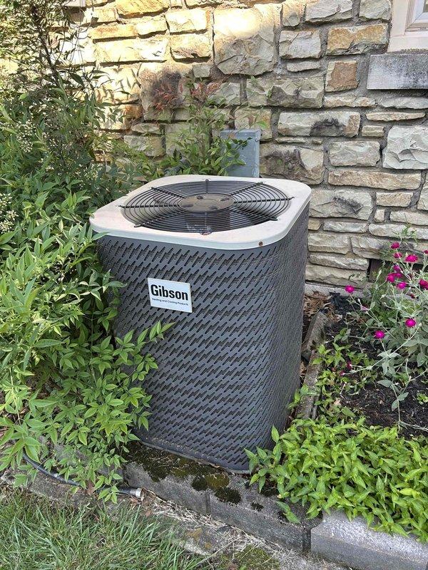 Responded to no cooling call for 6-year-old Gibson air conditioning system. Upon arrival, verified system was not running and measured supply air temperature at floor register reading 77.5°F, confirming lack of cooling. Inspected outdoor condenser unit and found equipment in good physical condition with proper clearances from surrounding landscaping. Diagnosed issue, restored system to proper operation, and verified adequate airflow through floor registers.