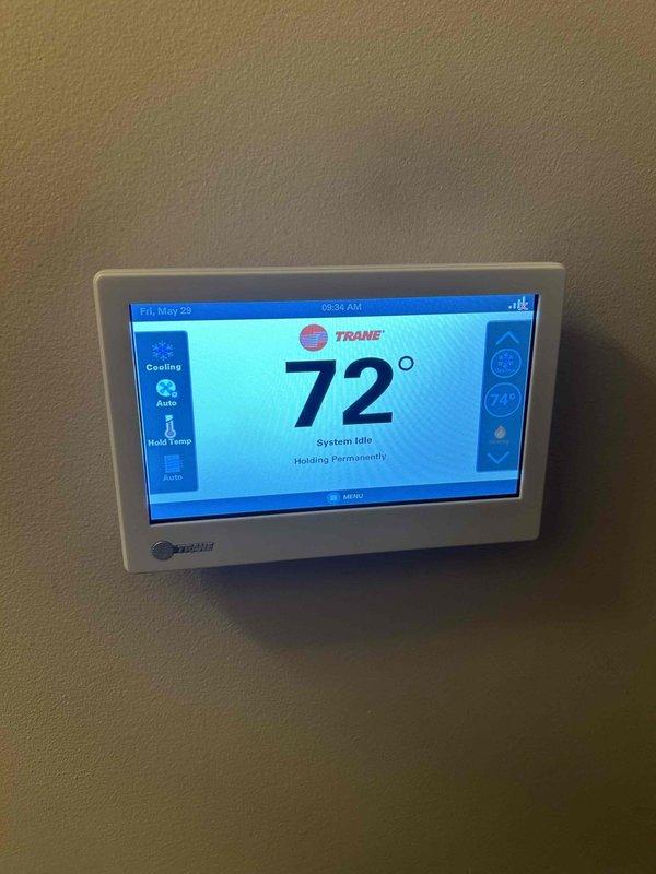 Completed annual Care Plan tune-up on Trane heat pump and air handler system located in attic. Performed comprehensive maintenance inspection including checking thermostat operation (confirmed system holding at 72° and functioning properly), inspecting attic-mounted equipment, and verifying two 20x20x1 return filter grilles in ceiling. All system components operating within normal parameters at time of service.