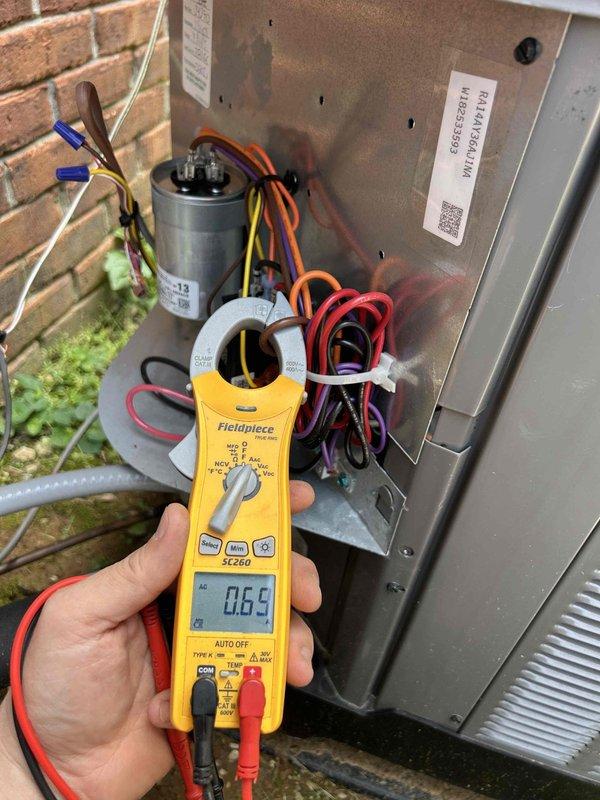 Completed preventative maintenance tune-up on heat pump system located in attic as part of club membership care plan. Performed comprehensive system inspection including electrical testing with clamp meter showing proper amperage draw of 0.59A, verified capacitor operation and connections, and inspected all wiring and components for proper operation. Customer provided 16x25x1 filter for unit, all ductwork and electrical connections found secure and functioning within manufacturer specifications.