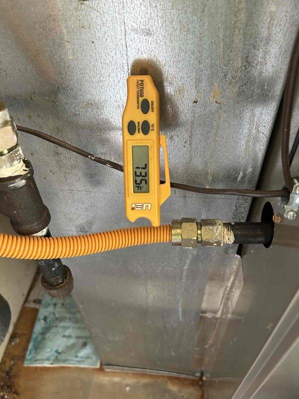 Responded to no cooling complaint on 4-year-old Carrier downstairs system. Performed diagnostic evaluation of indoor air handler and measured supply air temperature at 55.5°F. System had been providing adequate heating but failed to reach cooling setpoint. Inspected ductwork connections, refrigerant lines, and electrical components for proper operation and identified cooling system malfunction requiring correction.