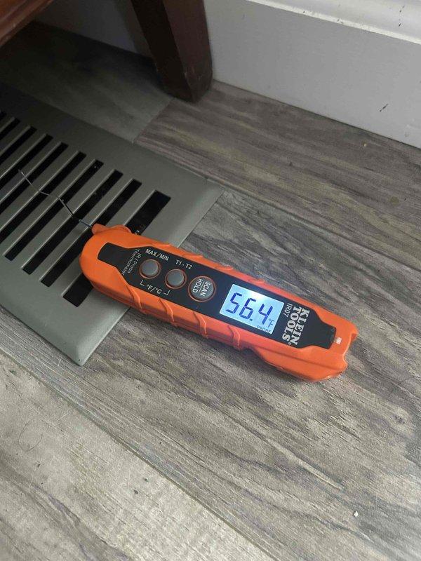 Responded to no cooling complaint on residential air conditioning system. Upon arrival, performed temperature diagnostics at supply register measuring 77.1°F and return air at 56.4°F, indicating inadequate temperature split and confirming insufficient cooling capacity. System requires further diagnostic evaluation to determine root cause of cooling deficiency, which may include refrigerant charge verification, airflow assessment, and component functionality testing.
