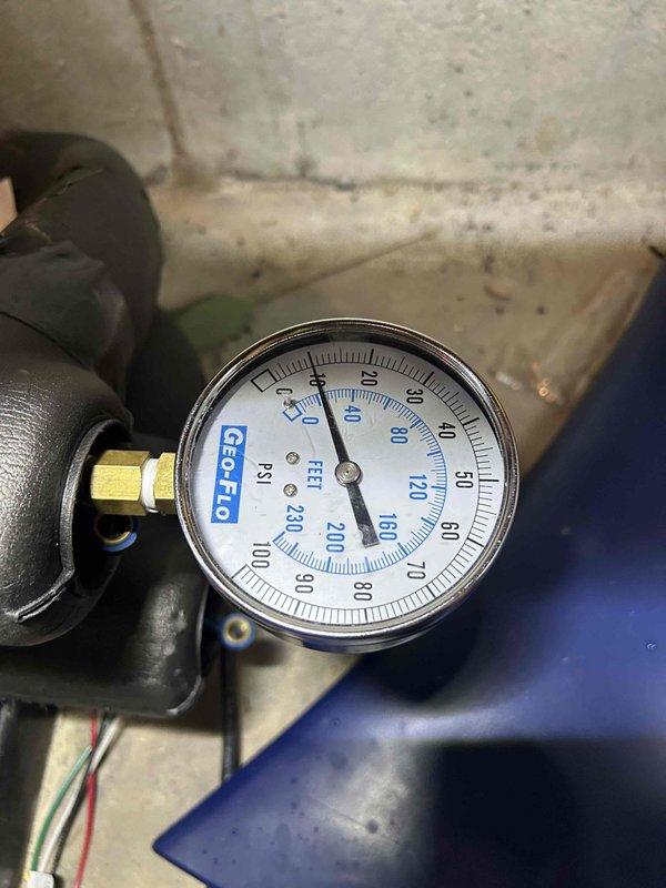 Responded to callback for 3rd floor geothermal unit experiencing intermittent cooling failure. Upon arrival, verified system operation and reviewed previous service notes indicating compressor monitor error code occurring after extended run times. Confirmed compressor jacket had been previously removed to improve heat dissipation. Monitored system through multiple cooling cycles while verifying refrigerant pressures, temperatures, and electrical parameters remained within manufacturer specifications. Cycled thermostat between cooling modes and observed proper system response with setpoint holding at 70°F. Unable to replicate compressor monitor fault code during this visit. System operating normally with adequate airflow and cooling capacity at time of departure.