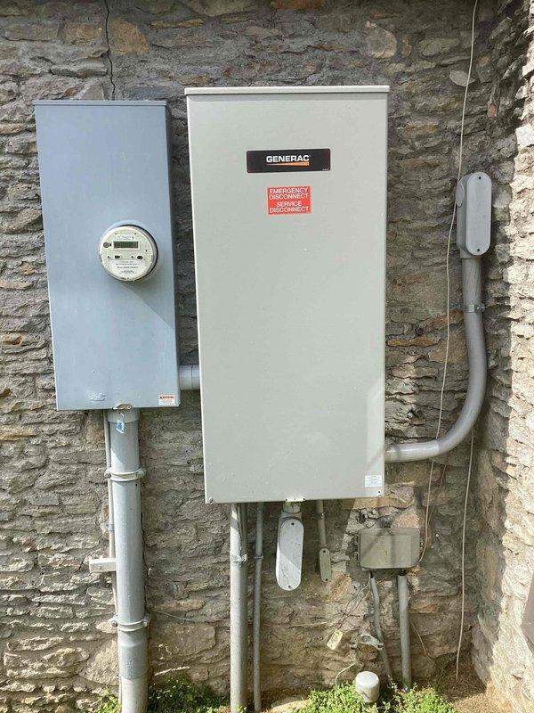 Performed comprehensive maintenance service on a Generac Guardian Series 20kW air-cooled standby generator. Conducted thorough inspection of unit physical condition and enclosure integrity, both interior and exterior components. Completed full fuel system inspection including lines, connections, and fuel quality verification. Performed battery load test and electrical system diagnostics to ensure proper starting capability.

Inspected and tested all electrical connections including high voltage generator output and low voltage control circuits. Verified proper operation of transfer switch and metering equipment mounted on building exterior. All conduit connections and weatherproofing seals examined for integrity.

Replaced spark plugs, air filter, and oil filter per manufacturer specifications. Performed complete oil change with proper disposal of used fluids. Adjusted valve clearances to factory specifications to ensure optimal engine performance and longevity.

Executed comprehensive