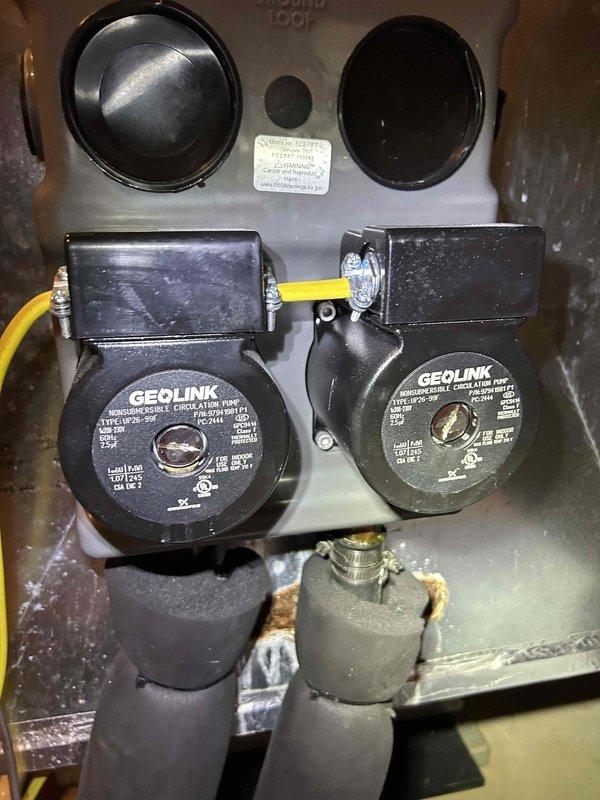 Responded to service call for geothermal system with reduced cooling performance. Upon arrival, inspected mechanical compartment and found GeoLink circulation pumps operational but measured system amperage at 17.70A, indicating potential electrical or flow issues affecting heat exchange efficiency. Photographed pump configuration, electrical connections, and control wiring for documentation. System remained partially functional with reduced capacity; recommended monitoring performance and potential follow-up for circulation pump adjustment or ground loop flow verification to restore full cooling output.