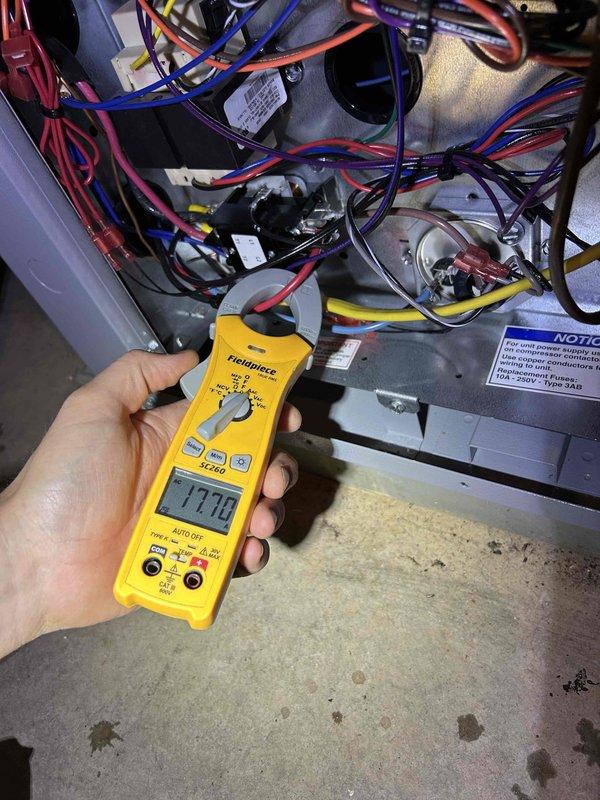 Responded to service call for geothermal system with reduced cooling performance. Upon arrival, inspected mechanical compartment and found GeoLink circulation pumps operational but measured system amperage at 17.70A, indicating potential electrical or flow issues affecting heat exchange efficiency. Photographed pump configuration, electrical connections, and control wiring for documentation. System remained partially functional with reduced capacity; recommended monitoring performance and potential follow-up for circulation pump adjustment or ground loop flow verification to restore full cooling output.
