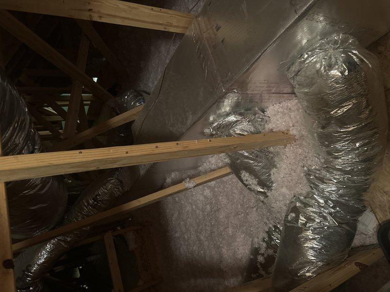 Conducted comprehensive system evaluation for complete HVAC replacement on 8-year-old equipment due to air quality concerns and inability to clean existing ductwork. Inspected attic-mounted flexible ductwork installation and documented extensive duct system requiring full replacement along with heating and cooling equipment. Provided detailed assessment and replacement recommendations for both HVAC system and complete duct work replacement to address indoor air quality issues and system performance.