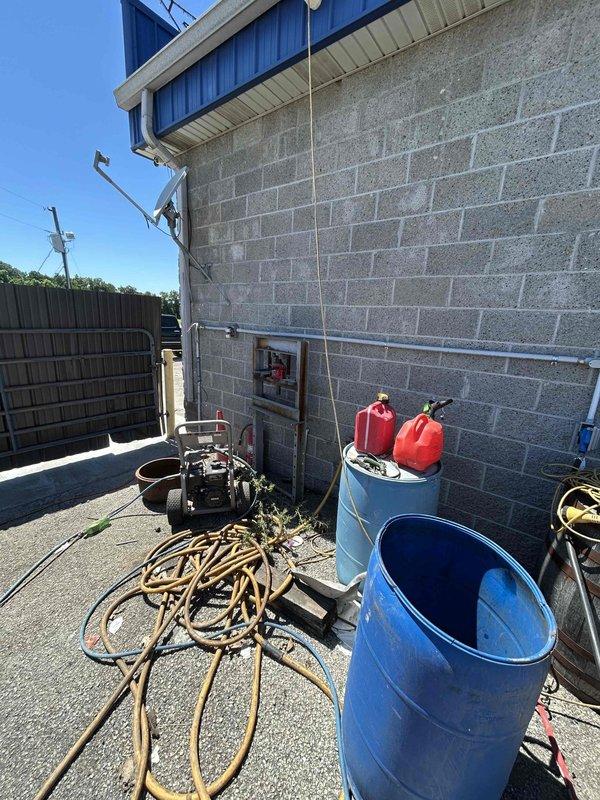 Conducted site assessment for 240V 100-amp electrical service installation to future barn location. Evaluated existing electrical infrastructure, photographed utility area with material staging including conduit coils and reviewed main electrical panel to determine capacity and routing requirements for new service run.