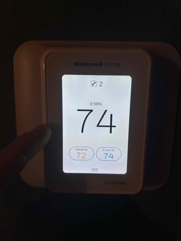 Completed preventative maintenance tune-up on dual heat pump and air handler system located in basement and second floor closet. Performed comprehensive inspection, tested system operation and airflow at supply registers, verified thermostat programming and temperature control functionality, and documented equipment performance with diagnostic readings showing proper operation at 74°F ambient conditions.