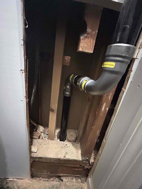 Responded to gas leak emergency after utility company identified leak and shut off gas service. Located and isolated leak in gas line running along exterior garage wall. Opened interior wall cavity to access compromised gas piping, exposed framing and existing infrastructure for proper assessment. Conducted pressure test using calibrated gauge to verify system integrity and confirm leak location. Demonstrated isolated leak section to customer and explained repair requirements. Installed new gas line section over two-day period to replace damaged piping and restore safe gas service to residence.