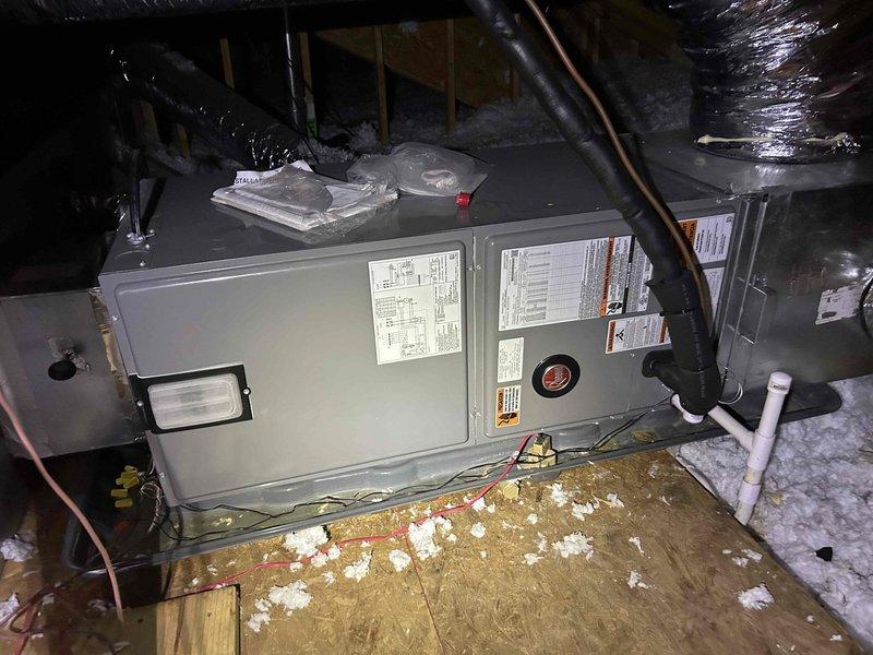 Completed routine AC tune-up on 5-year-old heat pump/air handler system located in attic space. Performed standard maintenance procedures including inspection of refrigerant lines, electrical connections, and ductwork. Replaced 16x20x1 air filter as requested. Verified Honeywell ProSeries thermostat operation and system functionality; all components operating within normal parameters with no issues identified.