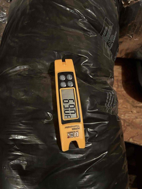 Completed preventive maintenance tune-up on heat pump and air handler system located in attic as part of club membership care plan. Performed standard diagnostic testing including temperature differential measurements showing 170.1°F and electrical readings of 0.98A and 0.2V using calibrated testing equipment. Inspected washable filter, verified system operation, and documented equipment condition with photos for service records.