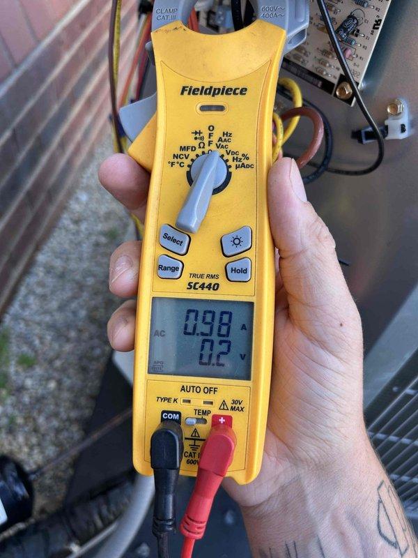 Completed preventive maintenance tune-up on heat pump and air handler system located in attic as part of club membership care plan. Performed standard diagnostic testing including temperature differential measurements showing 170.1°F and electrical readings of 0.98A and 0.2V using calibrated testing equipment. Inspected washable filter, verified system operation, and documented equipment condition with photos for service records.
