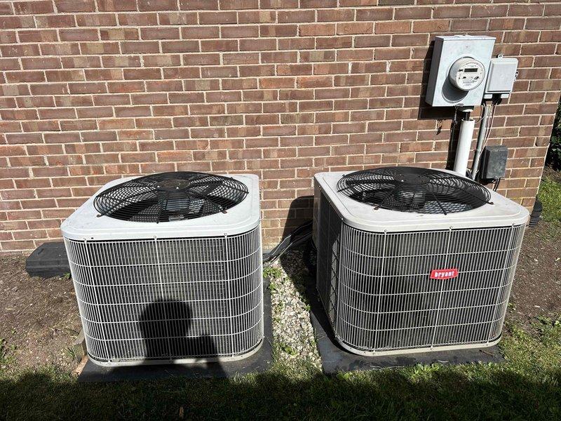 Completed Club Duo maintenance service on two systems: gas furnace located in basement and air conditioning unit in attic. Performed comprehensive system inspections including electrical testing with multimeter, verified all connections and components on furnace blower assembly, and inspected outdoor Bryant condenser unit along with secondary AC unit positioned on exterior pad. Replaced air filters per specifications with Green Pac filters (14x14x1 and 14x25x1 sizes) and confirmed both systems operating within normal parameters.