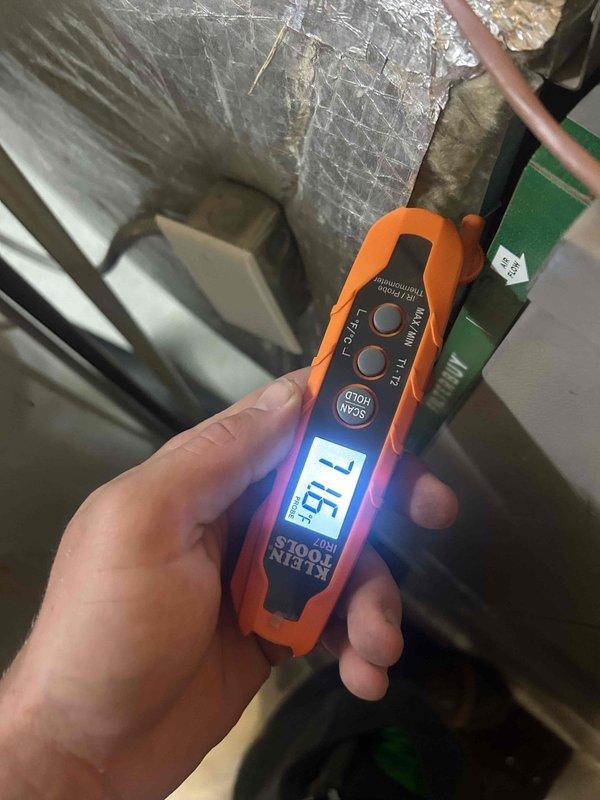 Completed comprehensive care plan tune-up on HVAC system located in basement. Performed electrical diagnostics using clamp meter, measuring system amperage at 85 amps and additional readings of 71.6 on secondary equipment to verify proper electrical performance and load characteristics. Documented equipment conditions with photos for maintenance records per club membership protocol.