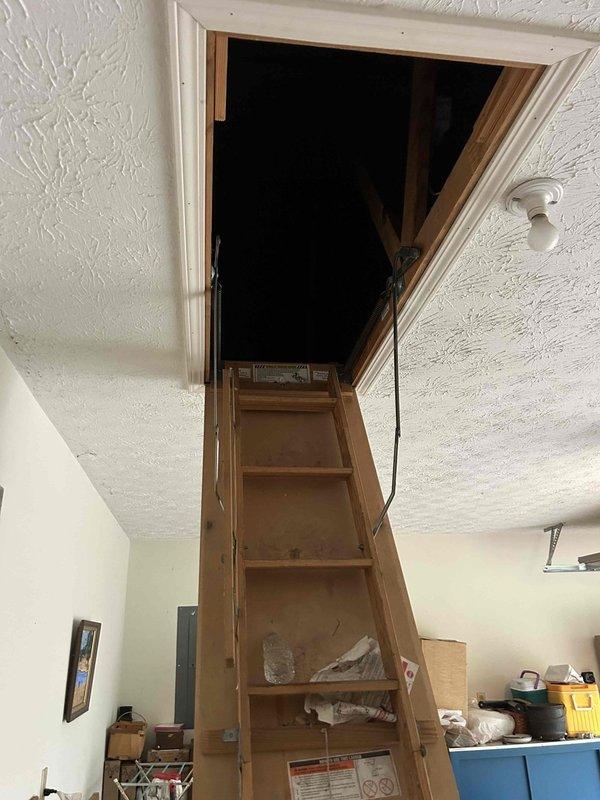 Completed semiannual maintenance inspection on a one-year-old air conditioning system located in the attic space above the garage. Accessed equipment via pull-down attic ladder and performed comprehensive tune-up including inspection of the AC unit and air handler, verification of refrigerant levels, electrical connections, and ductwork integrity. System operating within normal parameters with no deficiencies noted; Aprilaire #410 filter inspected and found in acceptable condition requiring no replacement at this time.