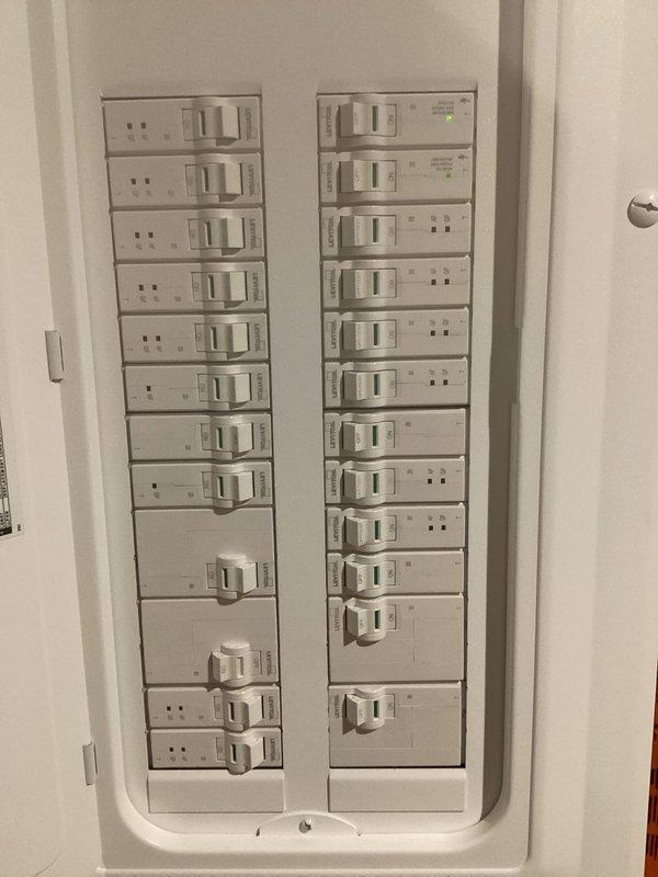 Conducted electrical site assessment for Kohler generator installation. Documented existing 42-circuit main electrical panel configuration, photographed circuit directory with labeled branch circuits serving living areas, HVAC systems, kitchen appliances, and air conditioning equipment. Evaluated panel capacity and available circuits to determine integration requirements for automatic transfer switch and generator connection.
