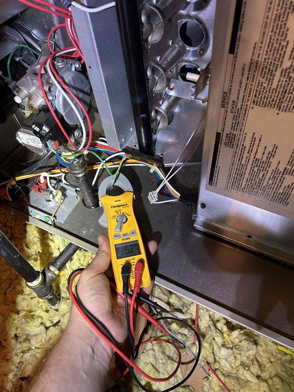 Completed Care Plan tune-up on attic-mounted air conditioning and gas furnace system accessed via garage. Performed comprehensive inspection of air handler unit, verified proper operation of all electrical components using calibration-grade testing equipment, and checked gas valve assembly functionality. Inspected internal wiring connections, motor operation, and control systems to ensure safe and efficient performance. Customer provided replacement air filters in specified sizes for installation during maintenance visit.