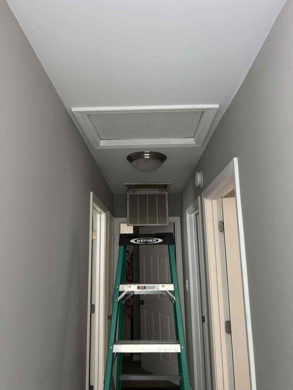 Responded to no cooling complaint on 3-year-old electric heat pump system. Accessed attic-mounted air handler unit and performed diagnostic evaluation for suspected refrigerant leak. Inspected ductwork connections, refrigerant lines, and condensate drainage system. Verified airflow from supply vents and checked system operation. Documented equipment condition and installation configuration for repair recommendations.