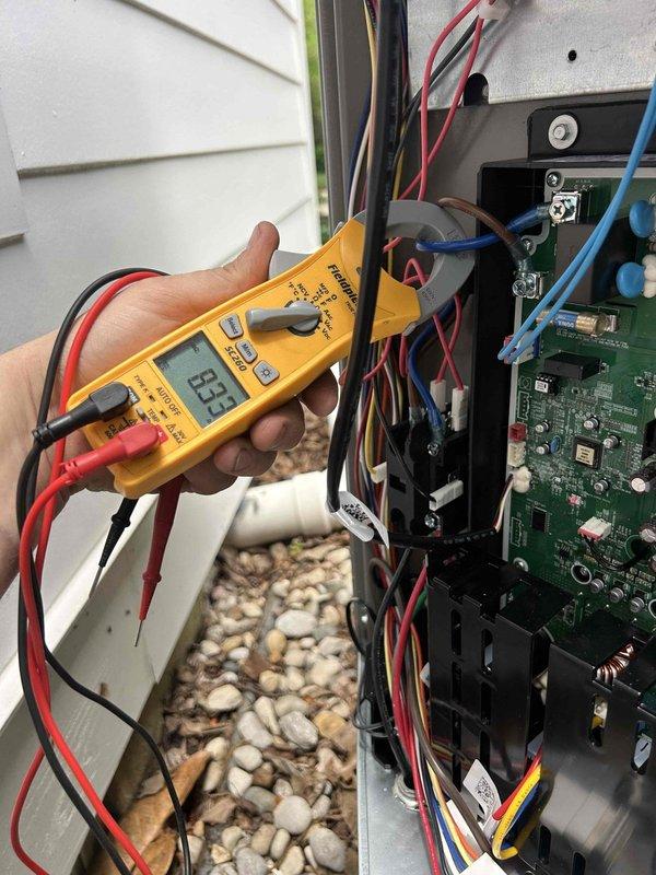 Responded to no-cool callback on recently installed whole-house AC unit displaying error code 434. Upon arrival, performed comprehensive electrical diagnostics using digital multimeter to test voltage and circuit integrity at outdoor unit control board. Measured low-voltage control circuits and verified power supply to system components. Inspected circuit board connections, capacitors, and wiring terminations for proper installation and secure connections. Tested system operation and monitored for fault code recurrence. Identified intermittent electrical issue related to control board or breaker interaction causing system shutdown. System operating at time of departure but recommended monitoring for code reoccurrence due to recurring nature of fault. All findings documented with diagnostic photos showing multimeter readings and control panel inspection. Unit remains under warranty coverage.