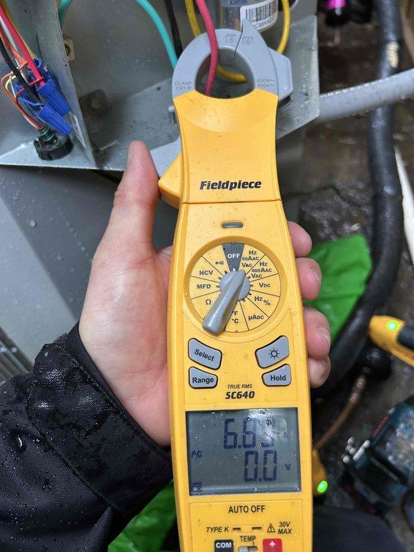 Responded to warranty call for recently installed system with no airflow from upstairs vents despite outdoor unit running. Upon inspection in attic space, discovered air handler blower motor failure. Verified electrical readings using clamp meter, confirmed motor winding issue preventing operation. Checked system levelness and proper installation of components. Replaced defective blower motor under warranty, restored full airflow to all upstairs vents, and verified proper system operation with temperature differential within normal parameters.