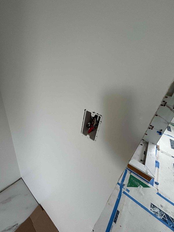 Completed electrical finish work for dormer remodel following inspection approval. Installed and terminated receptacles, switches, and wafer can lighting fixtures in renovated space with marble-tiled walls. Worked around limited attic access constraints to complete all rough-in connections and trim-out requirements.