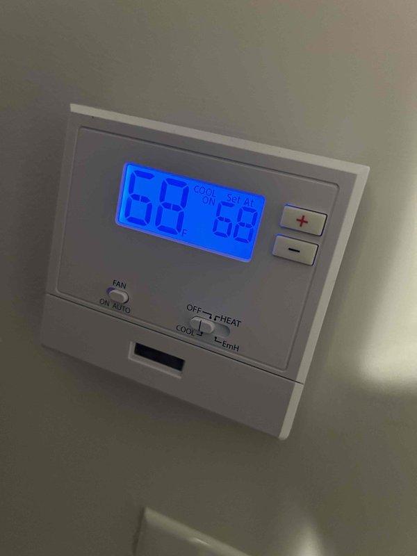 Responded to no cooling call at commercial building 6. Upon arrival, found thermostat calling for cooling with setpoint at 58°F but unit not operating. Performed electrical diagnostics at outdoor unit using multimeter, measuring 844V and 0.1A readings at control board. Traced wiring connections through control panel and identified faulty low voltage circuit preventing compressor engagement. Repaired electrical connections, verified proper voltage supply to all components, and restored system to normal cooling operation. Unit tested and confirmed operational before departure.