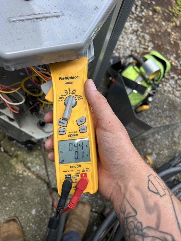 Responded to no cooling call at commercial building 6. Upon arrival, found thermostat calling for cooling with setpoint at 58°F but unit not operating. Performed electrical diagnostics at outdoor unit using multimeter, measuring 844V and 0.1A readings at control board. Traced wiring connections through control panel and identified faulty low voltage circuit preventing compressor engagement. Repaired electrical connections, verified proper voltage supply to all components, and restored system to normal cooling operation. Unit tested and confirmed operational before departure.