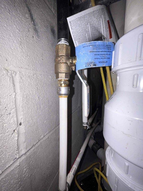 Responded to a BNI referral for a leaking valve on a pipe in the basement. Upon inspection, identified a faulty brass pressure relief valve on the water supply line near the water heater and filtration system. Repaired the leaking valve to restore proper function and prevent water damage prior to the scheduled home inspection. Updated customer contact information in the system for future service needs.