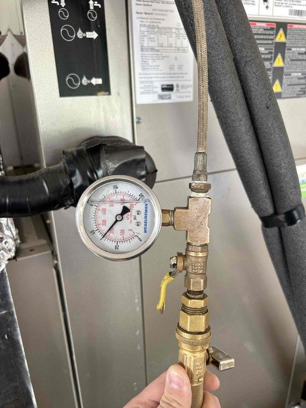 Completed care plan tune-up on geothermal HVAC system located in basement. Performed temperature verification at floor register measuring 55.5°F supply air and conducted pressure testing on system components using calibrated gauges. Customer provided 16x30x2 filter for maintenance service.