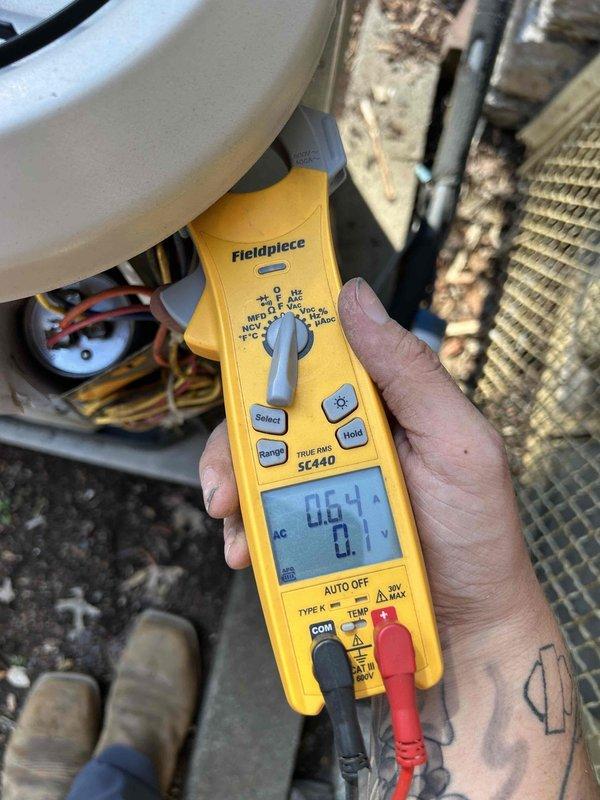 Responded to no-cool call for third-floor AC system with indoor temperature at 93°F. Performed electrical diagnostics using multimeter to test voltage and amperage at outdoor unit. Identified failed capacitor preventing compressor operation, evidenced by low voltage readings and visual inspection of deteriorated component near condenser coil with accumulated debris.