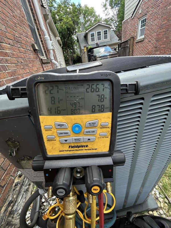 Performed comprehensive HVAC maintenance on residential gas furnace and air conditioning system. Conducted system diagnostics using digital manifold gauges to measure refrigerant pressures and temperatures on outdoor condensing unit, verifying proper operating parameters. Inspected outdoor unit condition, refrigerant line connections, and electrical disconnect, confirming all components functioning within manufacturer specifications.