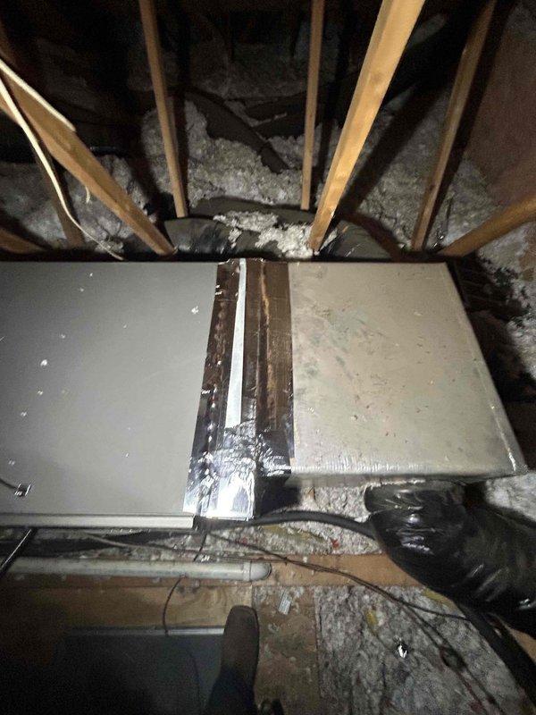 Completed full HVAC system replacement including installation of two Lennox 3-ton 2-stage air conditioning units with corresponding 80% efficiency 2-stage furnaces (Model EL280UH070E36AK), two evaporator coils (Model ML17KC2-024-2302), and two digital thermostats. Installed outdoor unit pads, electrical whip kits, disconnect boxes, refrigerant line insulation, and filter driers for both systems. Connected evaporator coils to existing ductwork with proper transitions and installed standard air filter racks. Completed all gas connections using flexible gas line connectors with shut-off valves and flame rollout protection devices. Reconnected and secured vent piping from furnaces through roof penetrations. Installed electrical shut-off switches for both systems and wired all components to code. Added SS2 coil drain safety water sensors to both evaporator coils for overflow protection. Constructed new walkway in attic space to furnace locations to stabilize flooring and provide safe access