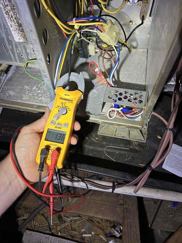 Completed comprehensive Care Plan tune-up on dual-system HVAC equipment consisting of air conditioning/gas furnace unit in basement and heat pump/air handler in finished upstairs area. Performed electrical diagnostics using multimeter to verify proper voltage and amperage readings on control board and relay systems, confirming all electrical connections were secure and functioning within manufacturer specifications. Inspected both systems including ductwork, condensate drainage lines, and all accessible components for proper operation and maintenance needs.