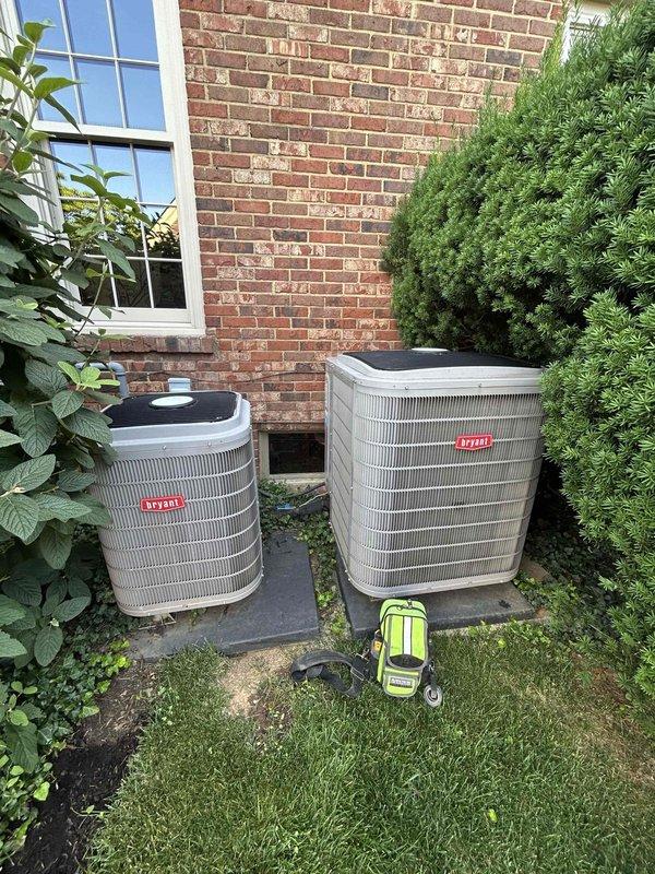 Completed comprehensive Care Plan tune-up on dual-zone HVAC system including two AC units with gas furnaces located in attic and basement. Performed full system diagnostics and electrical testing using clamp meter on both Bryant condensers, verified proper amperage draws and operational parameters. Installed customer-supplied air filters on both systems. Inspected Aprilaire 800 steam humidifier canister, noting unit is six years old and will require service during fall maintenance visit.
