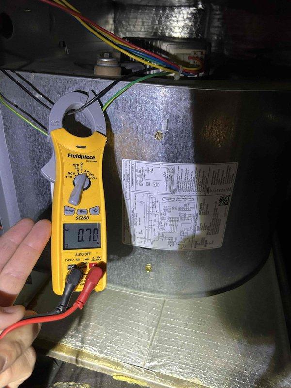 Completed Club Single maintenance service on geothermal system with dual air handlers located in attic and basement. Accessed attic unit through ceiling panel in closet area, performed diagnostic testing including electrical measurements on blower assembly using multimeter, and verified system operation. Customer provides their own filters for both air handler units.
