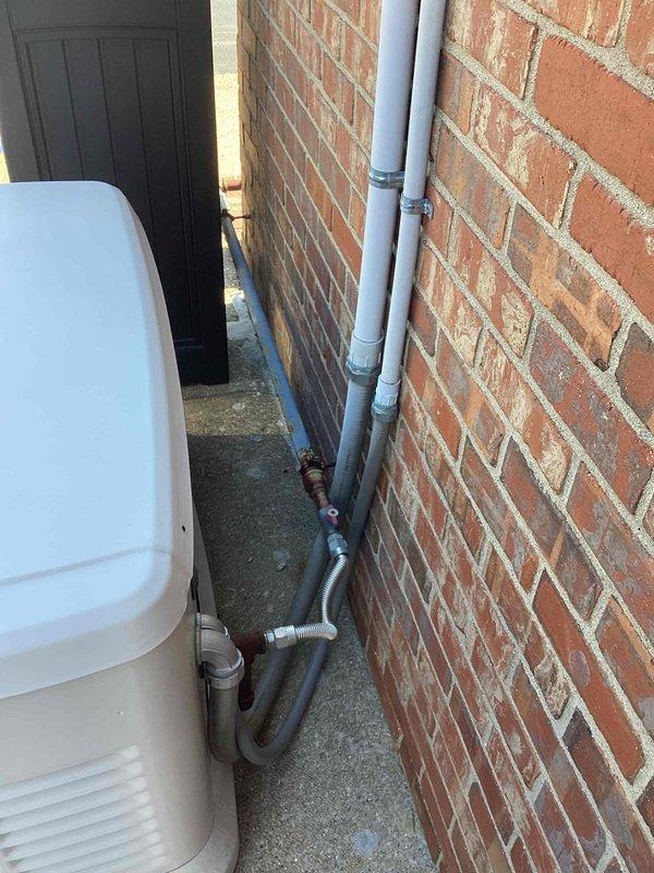 Completed scheduled preventive maintenance on Generac standby generator system. Inspected generator unit, transfer switch, and associated electrical connections in mechanical room. Verified proper operation of all components, checked refrigerant lines and conduit installations for secure mounting, and confirmed system readiness for automatic operation during power outages.