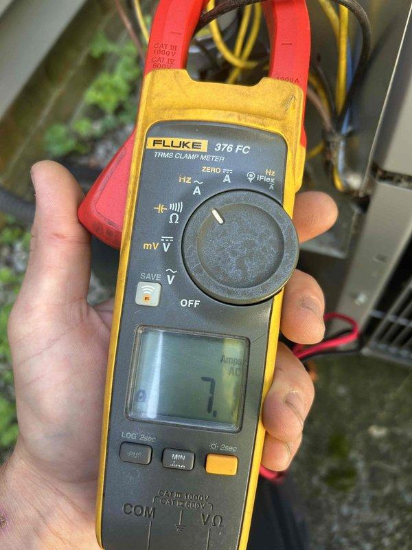 Completed comprehensive Care Plan tune-up on air conditioning system with equipment located in crawlspace. Performed detailed inspection of all system components, measured electrical amperage readings using clamp meter to verify proper compressor and fan motor operation within manufacturer specifications, and documented system performance with photographic evidence. Customer-provided filter was installed per service agreement requirements.