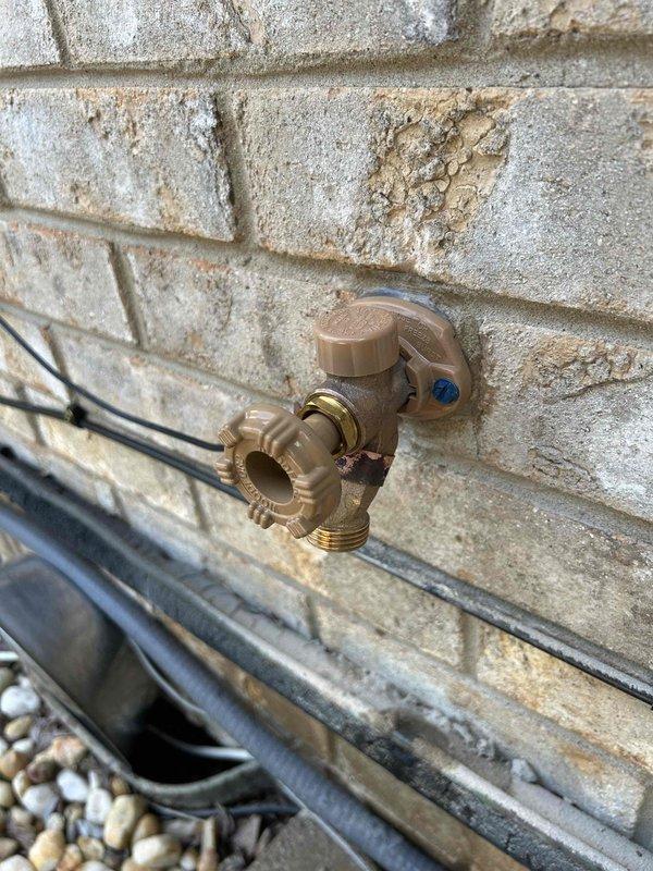 Completed comprehensive plumbing inspection as part of preventative service agreement, examining both interior and exterior plumbing fixtures and components. Interior inspection included under-sink P-trap assembly, drain piping, copper water supply lines with shutoff valves, and all visible connections, confirming proper installation and no signs of leaks or deterioration. Exterior inspection evaluated hose bib with vacuum breaker device and associated drainage piping, verifying operational functionality and proper mounting. All plumbing fixtures and components found to be in satisfactory working condition with no immediate service needs identified.