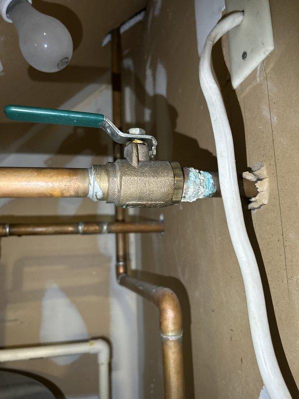 Completed comprehensive plumbing inspection as part of preventative service agreement (PSA). Inspected Rheem Professional series water heater installation in attic space, including copper piping connections, shut-off valves, and overall system condition. All components found to be functioning properly with no leaks or deficiencies noted; documented installation with photographs for service records.