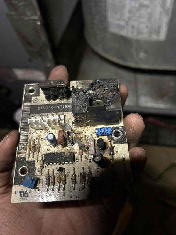 Responded to service call for HVAC system failure. Upon inspection, discovered severely damaged control board with extensive burn damage and charred wiring. The circuit board exhibited significant heat exposure with burn marks concentrated around major components, indicating electrical failure. Removed failed control board and replaced burnt wires, documenting wire color coding (green-C, brown-O, black-Y) for proper reconnection. Installed new control board with correct wiring configuration per manufacturer specifications. Tested system operation following repairs to verify proper functionality and identify any additional issues. Replacement part ordered under PO#191424345-001 and placed on will call at Corken for installation.