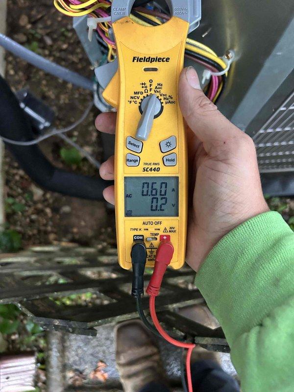 Completed semiannual air conditioning maintenance inspection on 4-year-old Bryant system under service contract. Performed comprehensive AC tune-up including electrical testing and system diagnostics using clamp meter to verify amperage draws and voltage readings at outdoor condenser unit. All measurements within normal operating parameters. Inspected condenser unit components, wiring connections, and outdoor equipment. System operating properly with no issues found. Customer provided 16x20x1 air filter for installation.