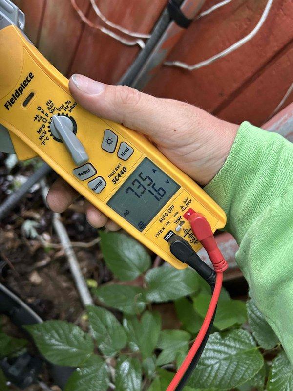 Completed routine maintenance on heat pump and air handler system located in attic space. Performed electrical diagnostics using digital multimeter, verifying voltage readings and system performance parameters. Inspected refrigerant lines, connections, and overall equipment condition, with customer providing their own filters for the service visit.